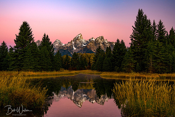 Dawn at The Grand Tetons as viewed in autumn from Schwabacher Landing, Grand Teton National Park