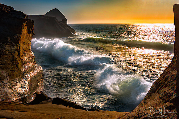 Waves Crash against the cliffs at Cape Kiwanda, Pacific City, Oregon