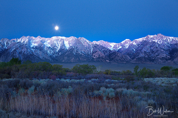 Lone Pine Peak with moon setting as seen from Moffat Ranch Road, California, Eastern Sierras.