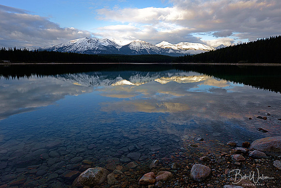 Sunrise on the Trident Range of the Canadian Rockies as viewed from Patricia Lake, Jasper National Park, Alberta, Canada.
