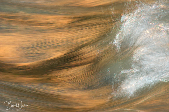 A closeup of a tiny ripple in the Virgin River of Zion National Park